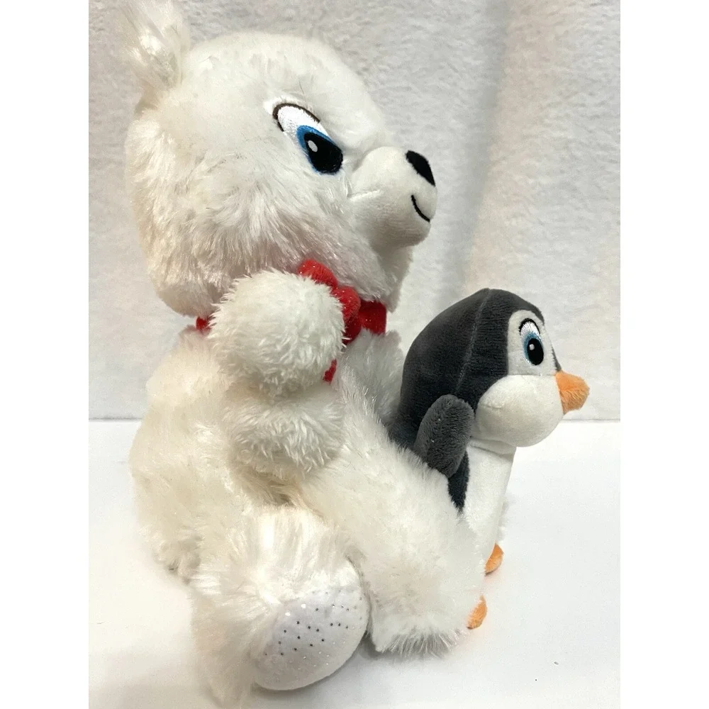 Plush animated Singing Bear holding a Penguin Singing, 